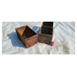 Two old adving wood crates.