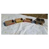 4  old wood pop crates  one is a wagon.