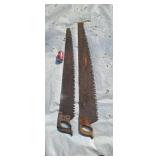 Two cross cut saws one is a ice saw