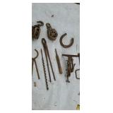 Old barn pulleys. Black Smith tools. Saw vice.