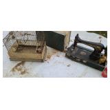 Singer sewing machine. Bird cage.