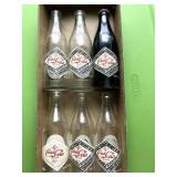 6 COMMEMORATIVE COCA COLA BOTTLES,