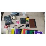 15 notebooks, radio, calculator and much more