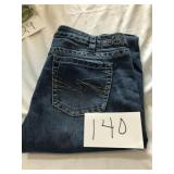 USED WOMENS SILVER JEANS W33 L35
