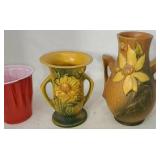 Two Roseville vases both chipped on top.