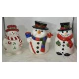 Three snow men cookie jars one has damage on