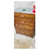 4. Drawer sewing cabinet with sewing supplies.