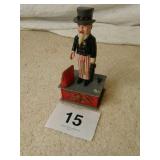 9 inch tall plastic Uncle Sam Bank
