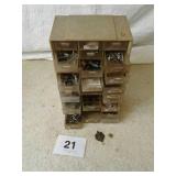 Multi part cabinet full of hardware