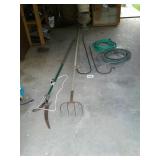 Hoses, shepherds hooks, silage rake, tree pruners
