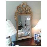 Brass colored beveled mirror 26 x 50