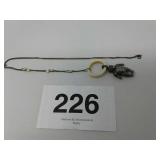 Antique Edwardian teddy bear rattle on bone ring