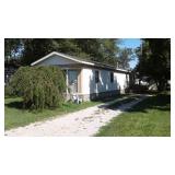 HOUSE TRAILER W/UTILITY SHED ON LOT