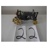 CAST IRON ANTIQUE TRACTOR