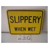 LARGE SLIPPERY WHEN WET HIGHWAY SIGN