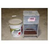 DOG FEEDER & 3/4 BUCKET OF DRYWALL COMPOUND