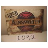 ANTIQUE AINSWORTH SIGN..MASON CITY, IL
