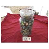 BALL JAR W/GLASS LID FULL OF MARBLES