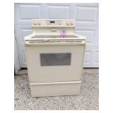 WHIRLPOOL GLASS TOP ELECTRIC STOVE...ALMOND