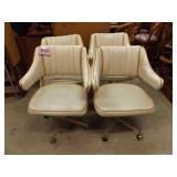 4 KITCHEN CHAIRS ON ROLLERS