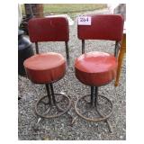 2 RED METAL STOOLS