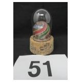 1 1/2" SWIRLED GLASS MARBLE IN CASE, SOME CHIPS