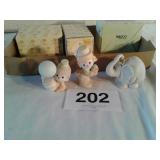 3 precious moments figurines