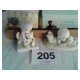 2 precious moments figurines
