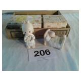 2 precious moments figurines