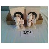 2 precious moments figurines