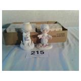 2 precious moments figurines