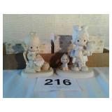 2 precious moments figurines