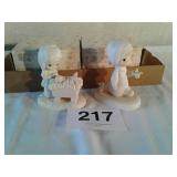 2 precious moments figurines