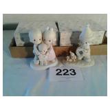 2 precious moments figurines