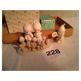 2 precious moments figurines