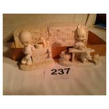 2 precious moments figurines