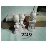 2 precious moments figurines