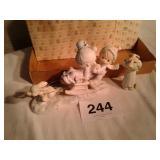 2 precious moments figurines