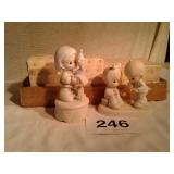 2 precious moments figurines