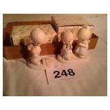 2 precious moments figurines