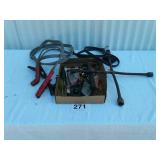 Jumper cables, lug wrench, hammer, socket set, etc