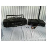 Portable cd/dual deck cassette/stereo player with