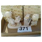 2 precious moments figurines