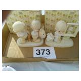 2 precious moments figurines