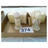 2 precious moments figurines