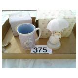 2 precious moments figurines