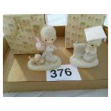 2 precious moments figurines