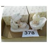 2 precious moments figurines