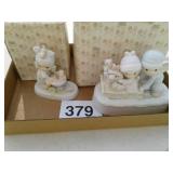 2 precious moments figurines