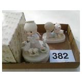 2 precious moments figurines